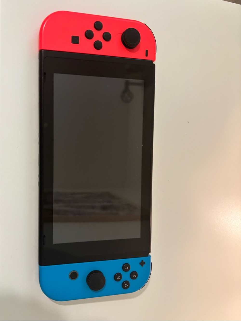Nintendo Switch with Neon Red and Neon Blue Joy-Con